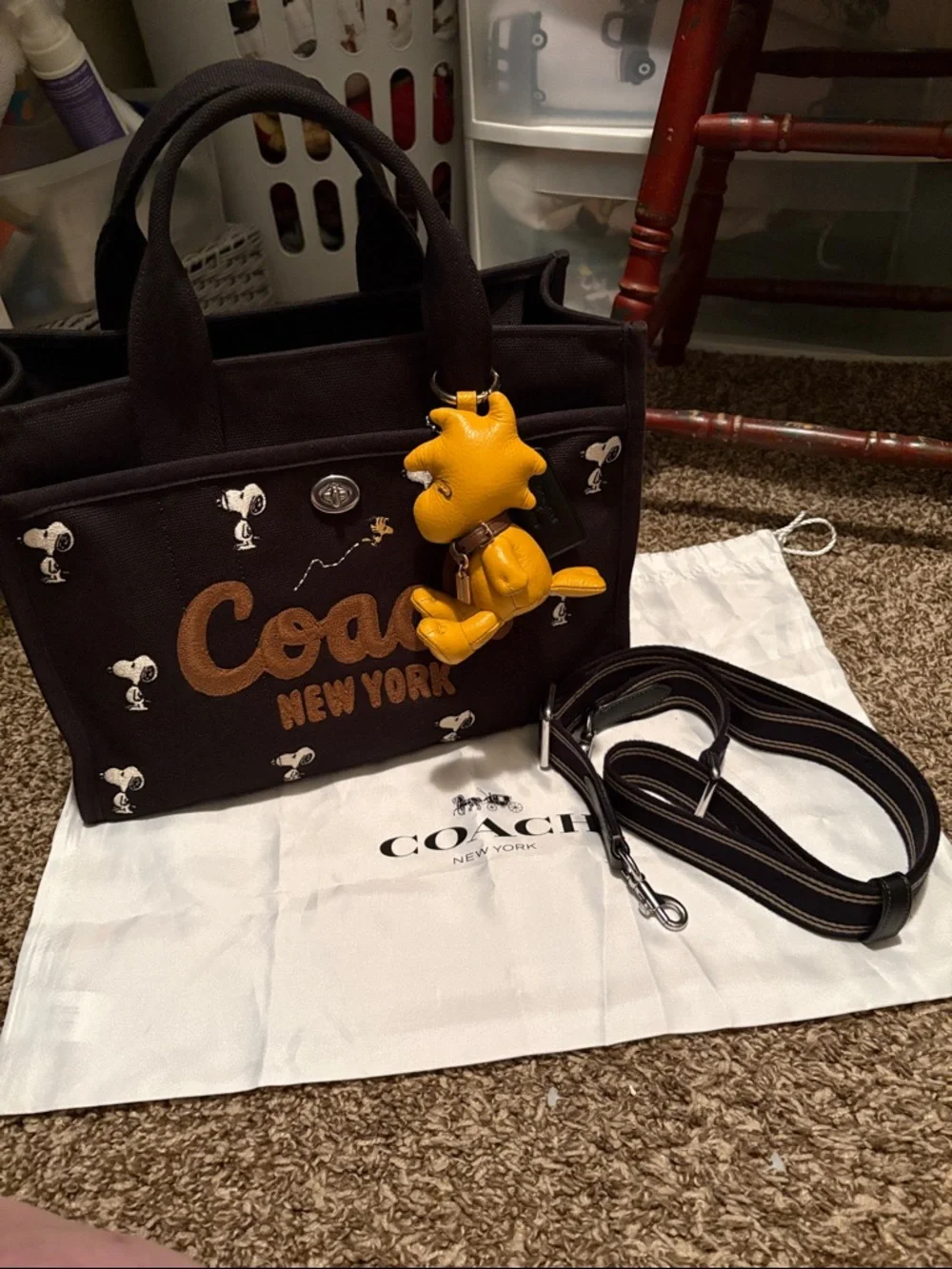 Coach X Peanuts Snoopy Black Canvas Tote with Yellow Woodstock Charm - Picture 1 of 9